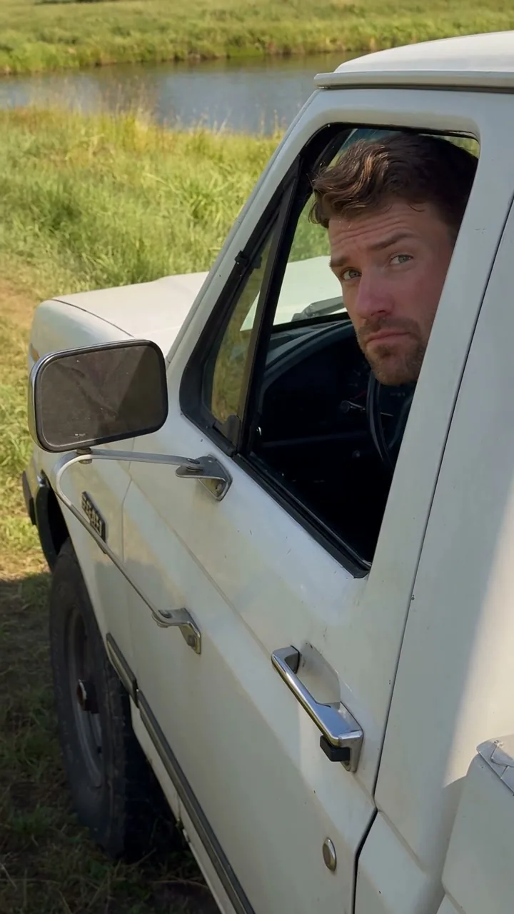 Hit the Road Dude AI preview: fictional human driver at a white pickup window